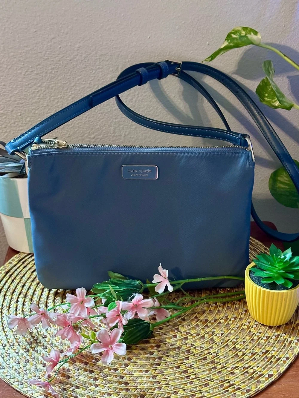 Kate Spade navy blue leather crossbody bag with adjustable strap